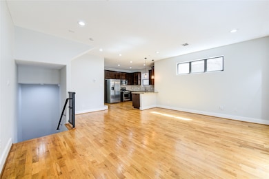 Situated between the kitchen and living room, the