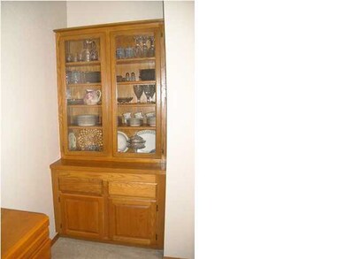 Built-in china cabinet in dining room.