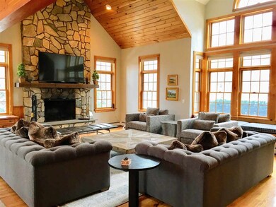 large, bright living area! Beautiful stone firepla