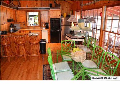 View from the dining room into the kitchen.