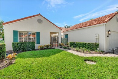 View of front of property featuring a tiled roof,