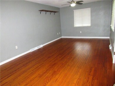 Additional view of living room/dining room combo.