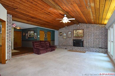 Inviting massive fireplace in family room!