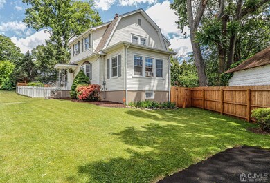 Side view of this well maintained Dutch Colonial o