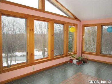 Other. This large sunroom has a vaulted ceiling. V