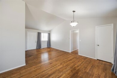 Unfurnished room featuring dark hardwood / wood-st