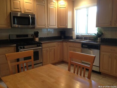 Brand new counter tops over oak cabinets w/stainle