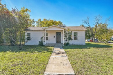 View of front of home featuring a front lawn