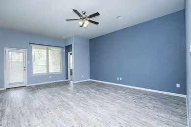 Living Room with opening to the covered patio.