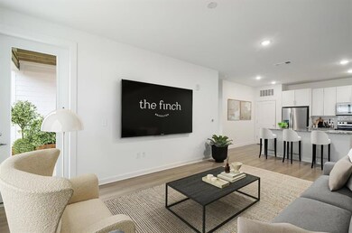 Living room with light wood-type flooring