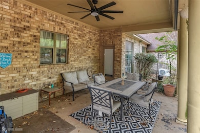View of patio featuring ceiling fan and outdoor dining area