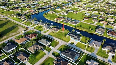 Aerial view of property and surrounding area with