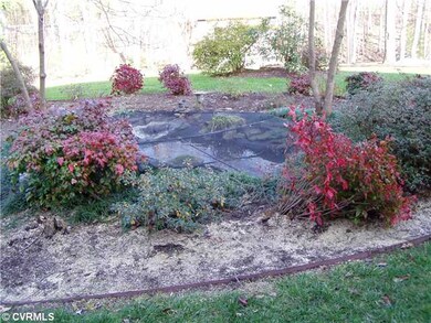 View - DECORATIVE REAR YARD FISH POND AND LANDSCAP