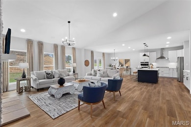 Living room with recessed lighting, a chandelier, dark wood-style flooring, and high vaulted ceiling