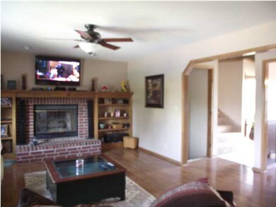 Lovely living room with fireplace and built-ins