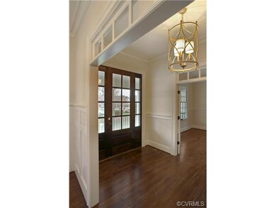 Sample of Foyer with oak hardwood floors, transom 