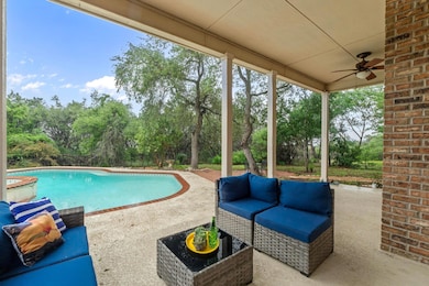 Swimming pool featuring a patio area, view of sca