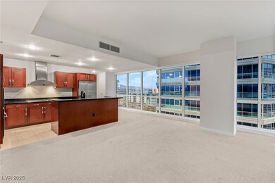 Kitchen featuring visible vents, built in fridge,