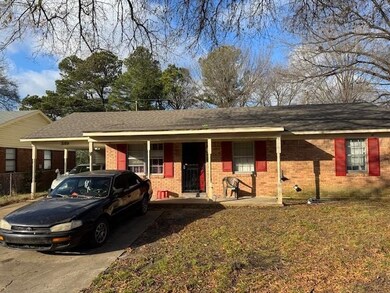 Single story home featuring a porch