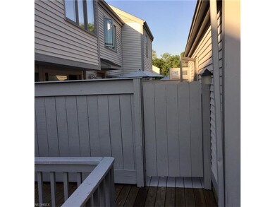 Gate to kitchen side patio and garage