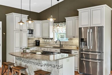 Sensational updated kitchen features cream colored