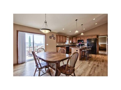 Dining Area. SLIDING GLASS DOOR TO 14X16 DECK AND 
