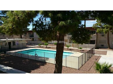Property Photo. View of pool from the balcony