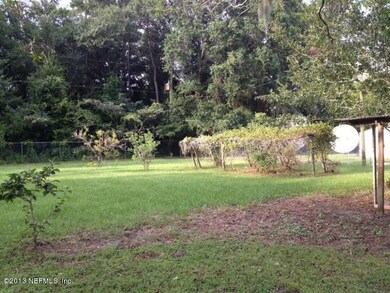 linda fruit trees and grape arbor