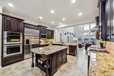 ALTERNATE VIEW OF KITCHEN  Opening to the family r