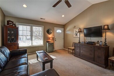 Sunny living room with vaulted ceilings