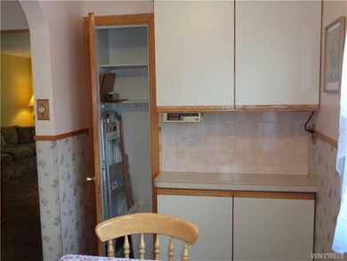 Kitchen Broom closet with more cabinets