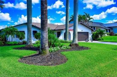 View of front of home featuring a garage and a fro