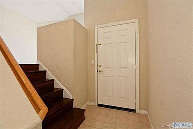 Front entry landing just inside, stair way goes up