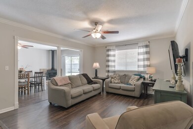 Bright light floods the open concept living space.