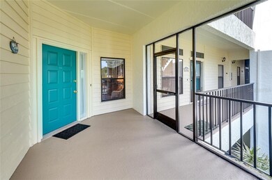Screened lanai at front entryway.