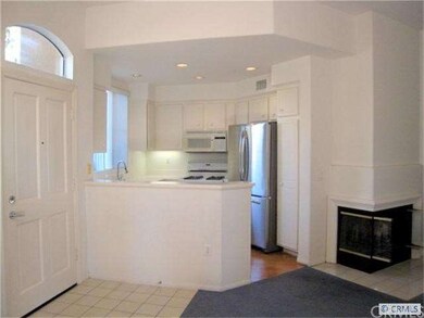 Bright entry leads to kitchen