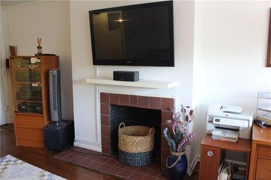 The flat screen TV and wall-mounted speakers are i