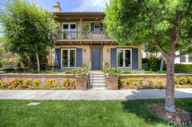 French doors and a balcony are beautiful accents t
