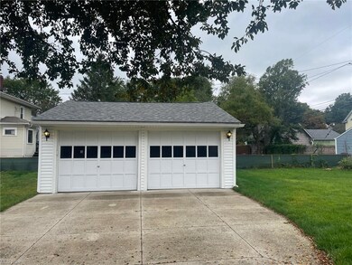 Garage with a lawn