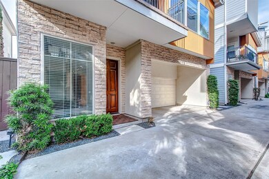 The modern exterior is accentuated by pops of colo