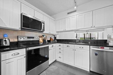 3526 Whitehall Dr unit 1060, West Palm Beach, FL 33401 - photo 2