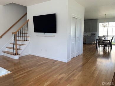 Entering the units you see the living room/dining room, and the beautiful, real oak, hardwood floors. The units are mirror images of each other.