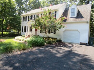 Paved drive, single car garage