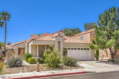 Mediterranean / spanish-style house with a chimney