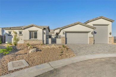 View of front of property featuring an attached ga