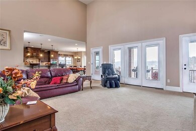 The Great Room Opens to the Kitchen and Rear Deck for Entertaining Ease
