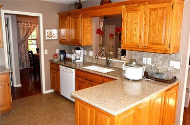 Quarts Countertops and beautiful Oak Cabinets.