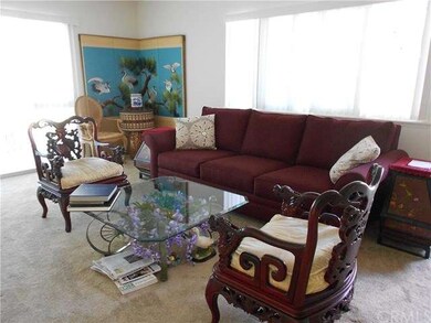 Bright living room with 2 large windows