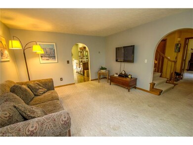 Living room with arched doorways