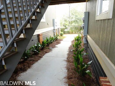 Landscaped walk way to entrance.